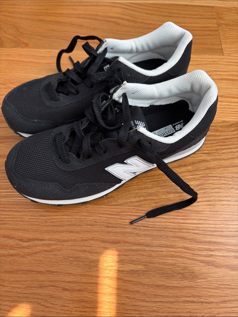 New Balance Kids Black and White Sneakers